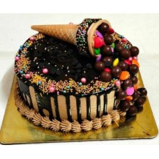 Chocolate Truffle Cake With Nutties And Gems (As Shown)