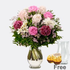 Flower bouquet spring mood with vase & 2 Ferrero Rocher