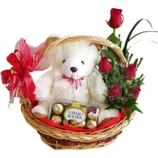 Small size Bear W/Ferrero Rocher Chocolate & Red roses in a basket.