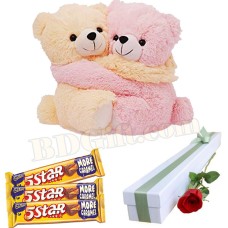 Bear with chocolate and rose