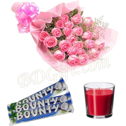Pink roses with chocolate and candle