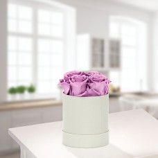 4 lilac roses in a hat box