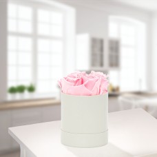 4 light pink roses in a hat box