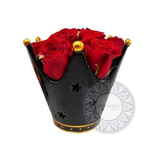 Red roses in ceramic crown