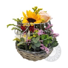 Fresh flowers in a cage style base