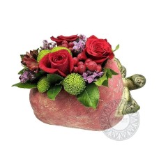 Ceramic strawberry with flower arrangement