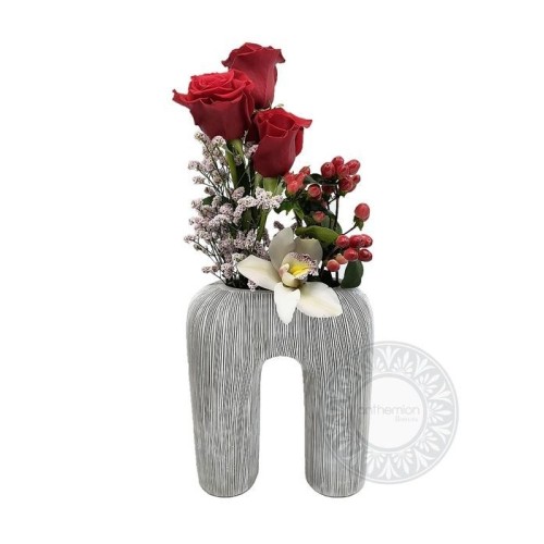 Embossed polyresin vase with flower composition