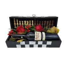 Chess board with flowers and wine