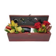 Wooden case with a bottle of wine and accessories