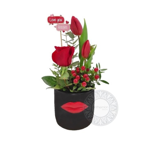 Rose and tulips in a black beauty