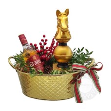 Arrangement with whiskey and decorative chess pawn