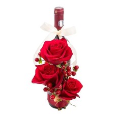 Love roses with a bottle of wine