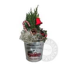 Festive decorative metal bucket with plants
