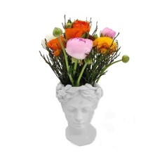 White ceramic hear with spring flowers