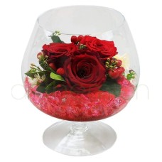 Roses in a cognac glass