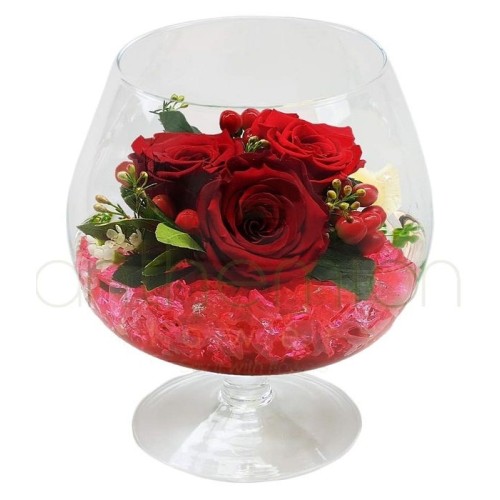 Roses in a cognac glass