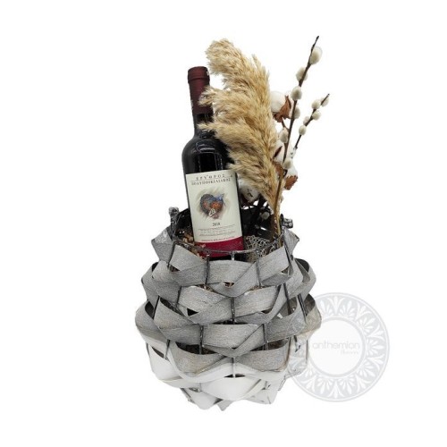 Lantern with decorations and bottle of wine