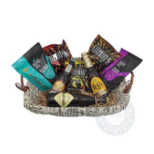 Basket with beers and nuts