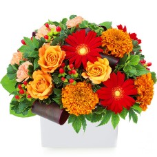 Arrangement of orange roses and red gerberas