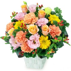 Arrangement of orange roses and bellflowers