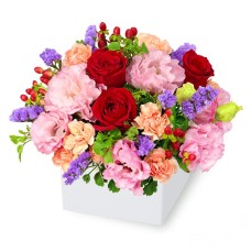 Cube arrangement of red roses and bellflowers