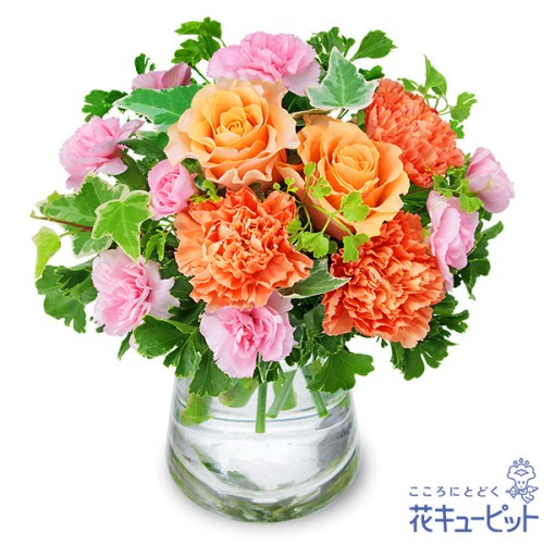 Glass bouquet of orange roses