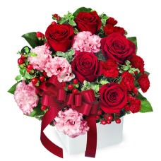 Cube arrangement of red roses and ribbons