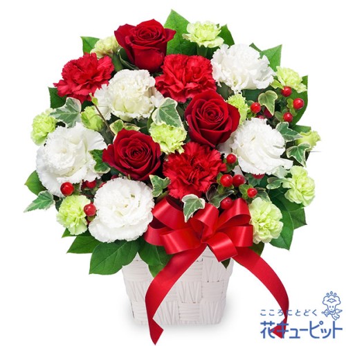 arrangement of red roses and red ribbon