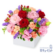 Cube arrangement of red roses and lisianthus