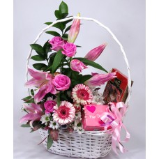 Sweet flower basket with lilies and roses
