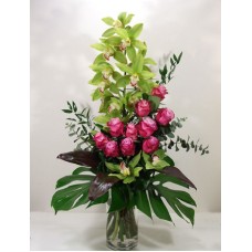 Luxurious bouquet with green orchids and roses