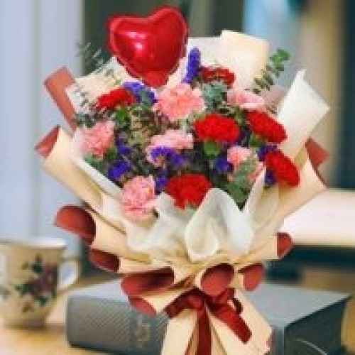 6 Pink & 6 Red Carnations Hand Bouquet.