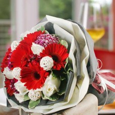 Gerbera, White Roses And  Twig Balls Handbouquet