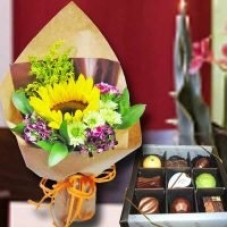 Small Sunflower Handbouquet and Chocolate.