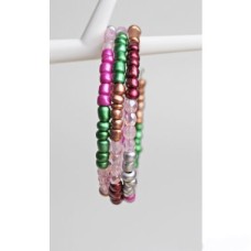 Bracelet on spiral with warm soft coloured rocaille beads