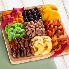 Dried Fruit Assortment with Almonds on Bamboo Cutting Board Serving Tray