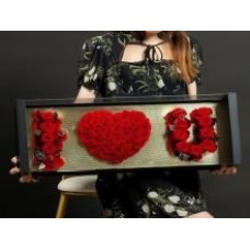 Red Roses Arranged In A Golden Black Box