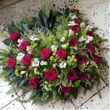 Memorial wreath with red roses