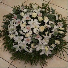 Funeral wreath with various white flowers