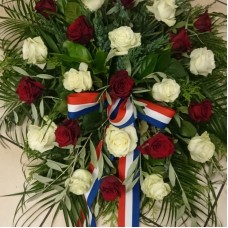 Funeral wreath with white and red roses