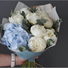 Bouquet of peonies and blue hydrangea