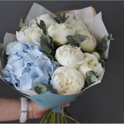 Bouquet of peonies and blue hydrangea