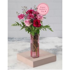 Purple Mothers Day Blooms In A Pink Vase