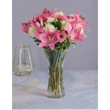 Pastel Seasonal Flowers In A Glass Vase
