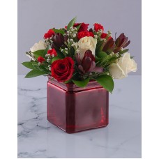 Vase of Red and Cream Roses
