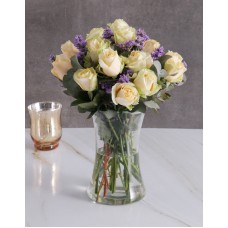 Cream Roses In Clear Vase