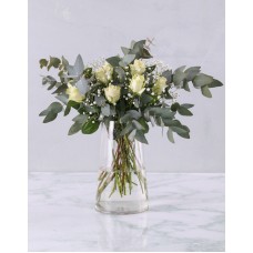White Roses In Clear Modern Vase