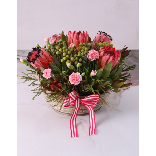 Pretty In Pink Shades Protea Arrangement