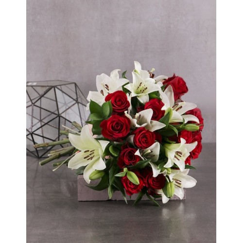Striking Red Roses and White Lilies