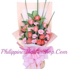 Truly Blessed Orange Roses and Pink Carnations